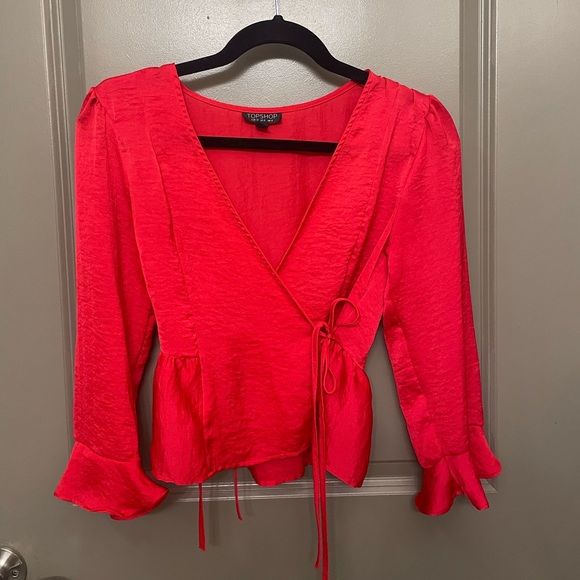 Topshop Tops - Top Shop red satin like top. Its like a crop top length. 3/4 sleeve. Size US 0